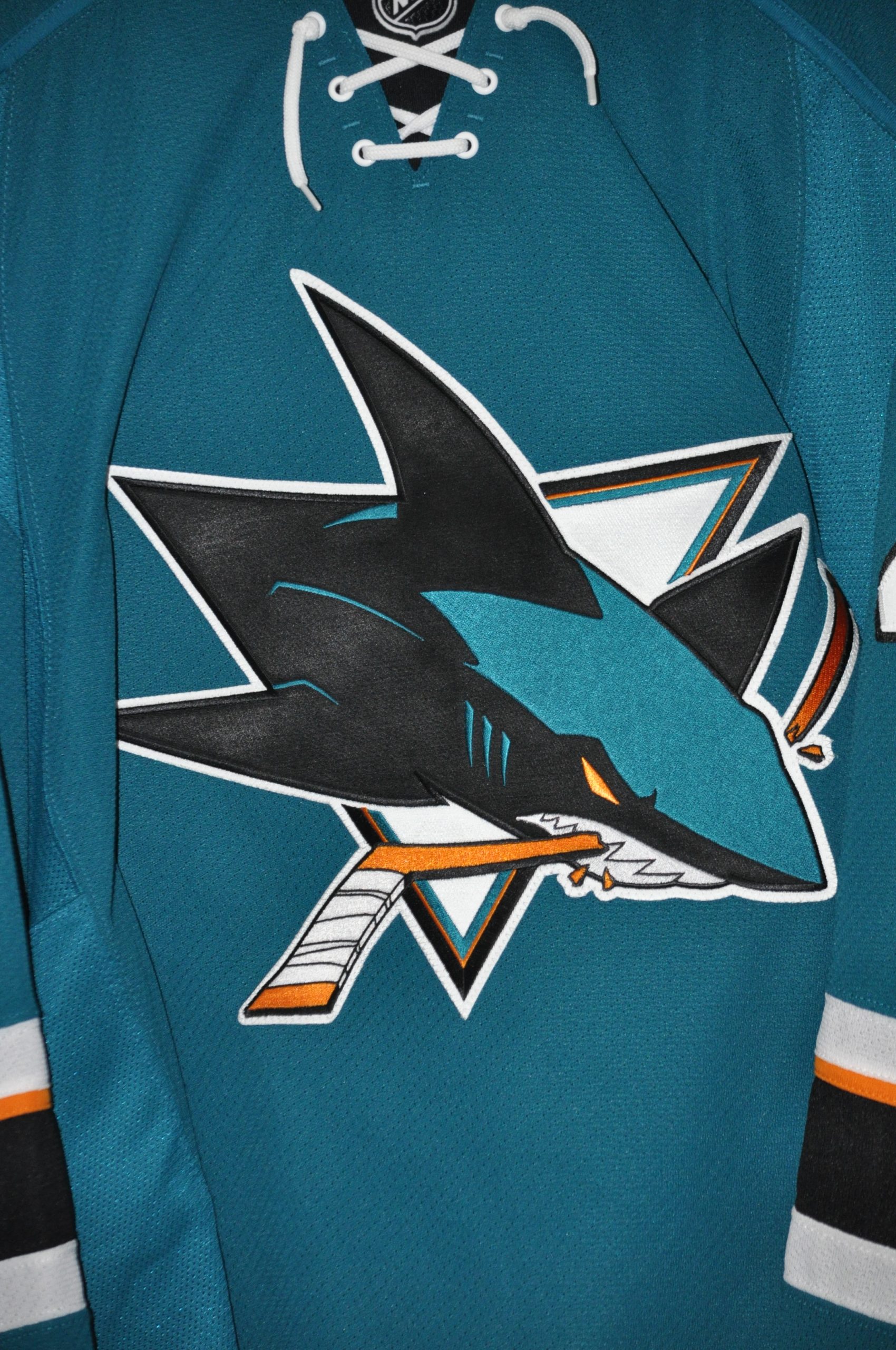 San Jose Sharks Joel Ward Teal Jersey with 100th Anniversary patch.